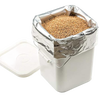 Large silver mylar bag filled with dry grains inside a white plastic container with lid off, ideal for long-term food storage, featured in Kitchen & Food, Grain Mills, USA Made, and Best Sellers collections.