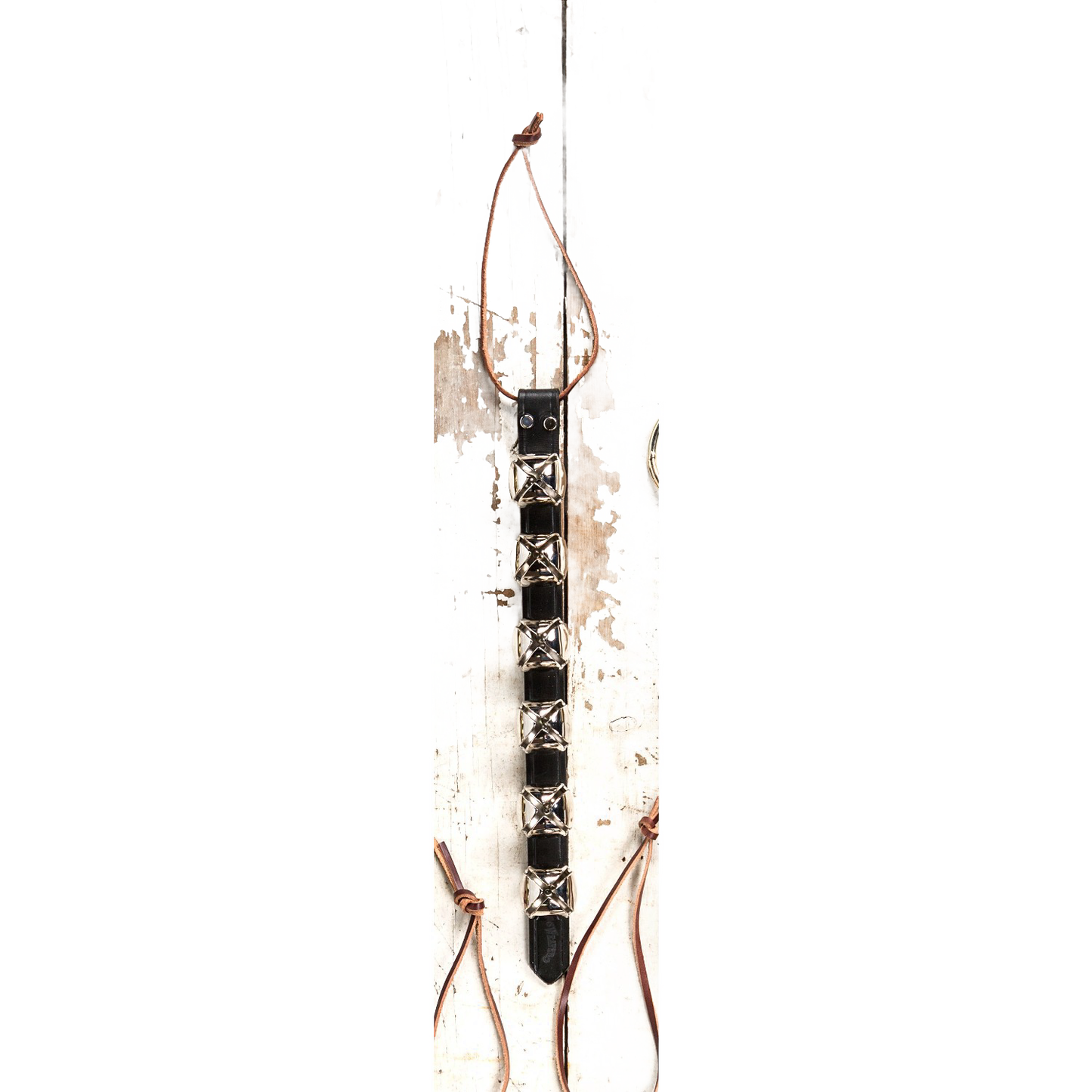 Handcrafted door hanger featuring six silver sleigh bells mounted on a black leather strap with leather ties, perfect for holiday decor, USA made, and part of best sellers.