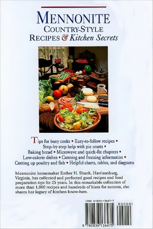 Back cover of a cookbook featuring a rustic kitchen scene with fresh vegetables, bread, and cooking ingredients, highlighting easy-to-follow recipes, canning tips, and kitchen secrets in collections like Toys, Books & Games and Cookbooks.