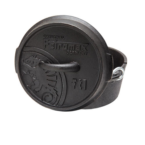 Black cast iron Dutch oven with flat base and embossed lid featuring a detailed dragon design and a sturdy handle, suitable for kitchen and outdoor use, included in Kitchen & Food, Cookware, Cast Iron, Best Sellers, and Promo Eligible collections.