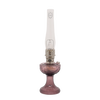 Antique-style oil lamp with rose-colored glass base and tall clear chimney, handcrafted and ideal for Farm, Garden & Tool, Lamps & Lighting, Oil Lamps, Table Lamps, Best Sellers, Homesteading, and Promo Eligible collections.