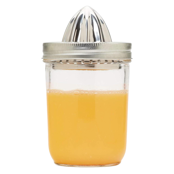 Sturdy stainless steel citrus juicer lid securely fitting a wide mouth jar filled with fresh juice, featured in Kitchen & Food, Juicers and Steamers, and Kitchen Gadgets collections.