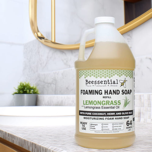 Handcrafted 64-ounce foaming hand soap refill scented with lemongrass essential oil, made with pure coconut, hemp, and olive oils, featured in Health & Wellness and Soaps collections.
