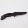 Handcrafted blackened stainless lockback folding knife with ergonomic textured handle and thumb stud, featured in Farm, Garden & Tool and Modern Pocket Knives collections.