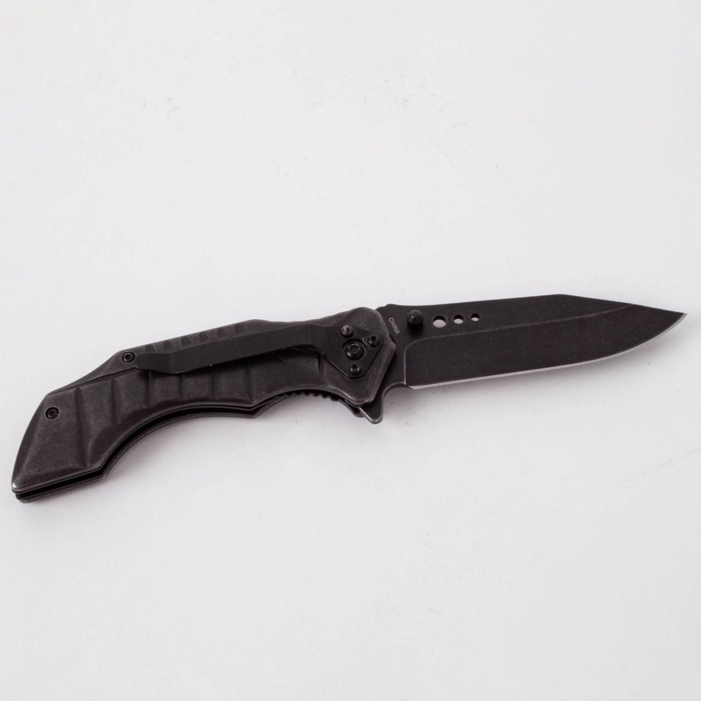 Handcrafted blackened stainless lockback folding knife with ergonomic textured handle and thumb stud, featured in Farm, Garden & Tool and Modern Pocket Knives collections.