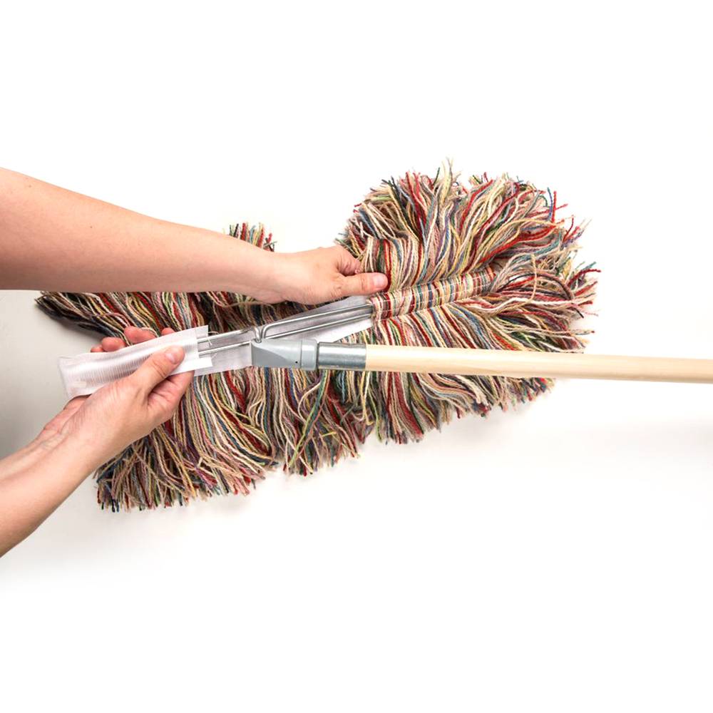 Hands attaching a removable wool mop head with multicolored fibers to a wooden handle, showcasing a handcrafted cleaning tool from USA Made collections including Home & Decor and Household Cleaning.