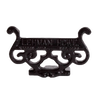 Glossy black cast aluminum boot scraper with intricate vintage scroll design, handcrafted by Amish artisans, ideal for Home & Decor, USA Made, and Best Sellers collections.