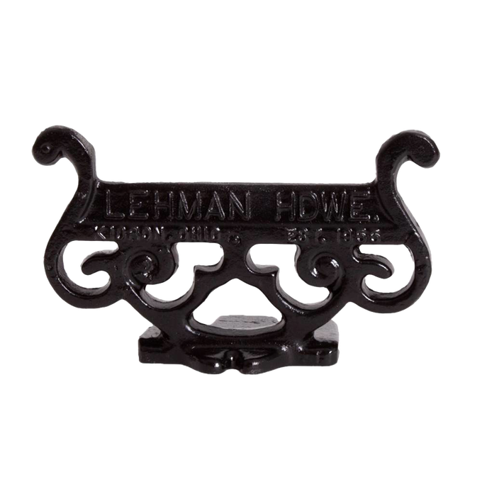 Glossy black cast aluminum boot scraper with intricate vintage scroll design, handcrafted by Amish artisans, ideal for Home & Decor, USA Made, and Best Sellers collections.