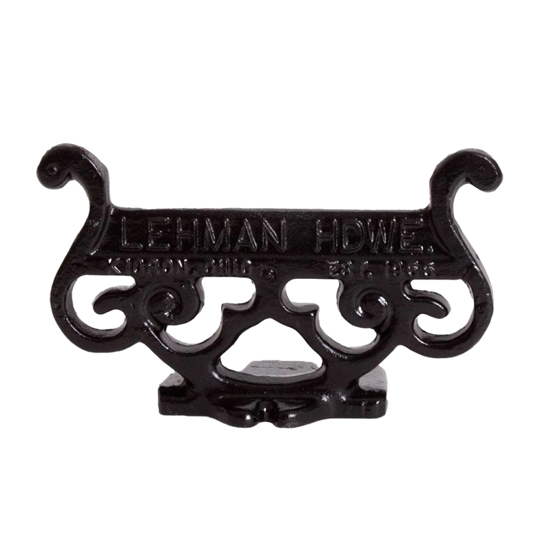 Glossy black cast aluminum boot scraper with intricate vintage scroll design, handcrafted by Amish artisans, ideal for Home & Decor, USA Made, and Best Sellers collections.