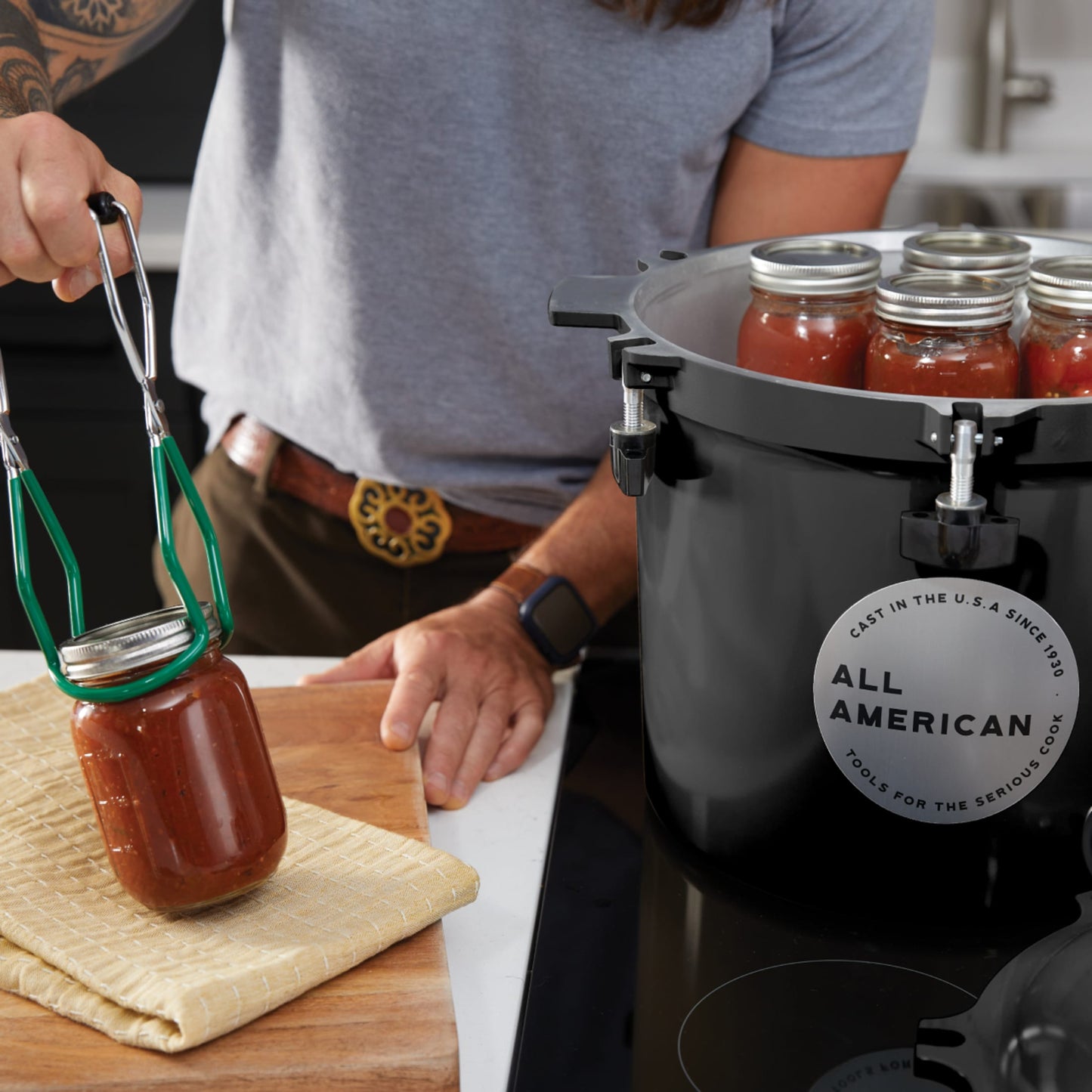 Glossy black 21.5-quart pressure canner with secure locking lid and sturdy handles, handcrafted in USA for Kitchen & Food, Food Preservation, Canning, Pressure Canners, and Best Sellers collections.