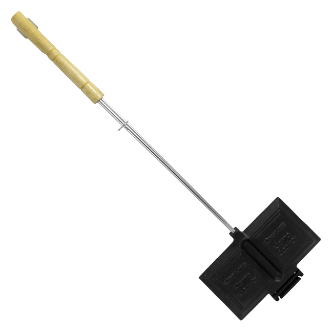 Double-compartment cast iron cooking tool with a wooden handle designed for making campfire sandwiches, featured in farm, garden, and camping collections.
