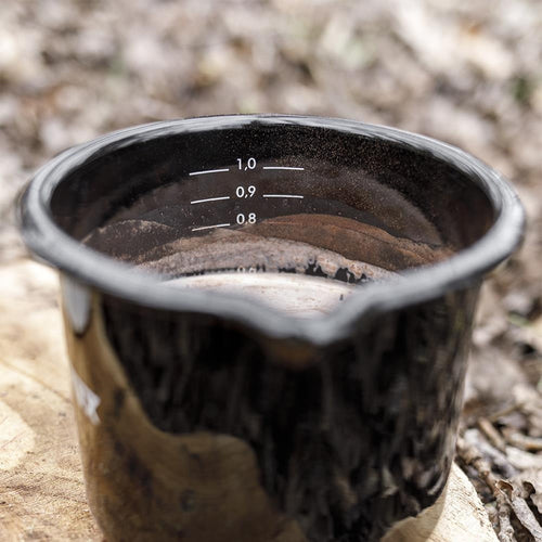 Black enameled steel milk pot with clear white volume markings and a pour spout, handcrafted for campfire cooking in Farm, Garden & Tool, Kitchen & Food, Camping, Cookware, Pots and Pans, and Best Sellers collections.