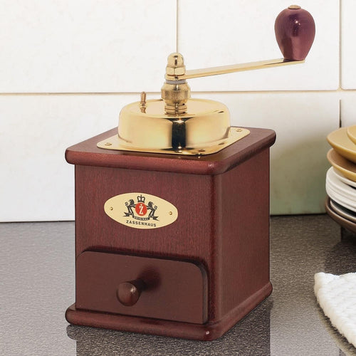 Handcrafted coffee mill with wooden body and brass top crank, designed for grinding fresh beans, ideal for Farm, Garden & Tool, Kitchen & Food, Brewing Coffee and Tea, and Homesteading collections.