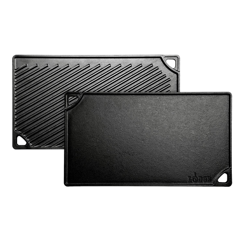 Reversible black cast iron griddle with a smooth flat side and a ribbed grill surface, featuring corner handles and durable construction, handcrafted in the USA, ideal for Kitchen & Food and Cast Iron cookware collections.