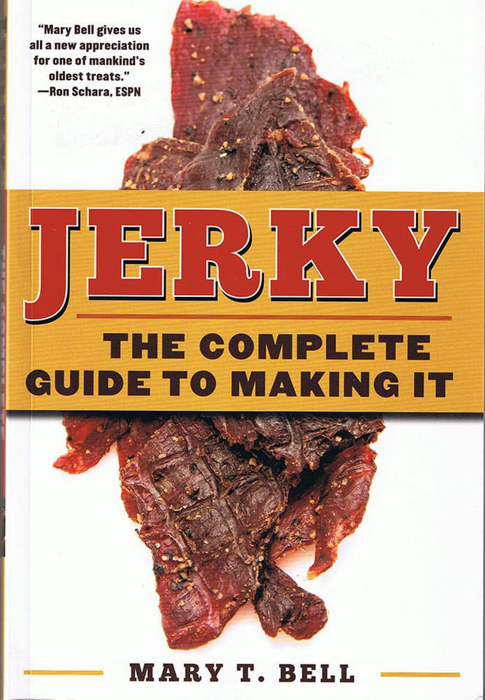 Cover of a cookbook featuring close-up dried jerky strips with bold text highlighting it as a comprehensive guide to making jerky, perfect for cookbooks and heritage collections.