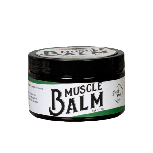 Small black jar of Yoder's Natural Muscle Balm with white label featuring bold text and green accents, crafted in the USA for Health & Wellness and Best Sellers collections.