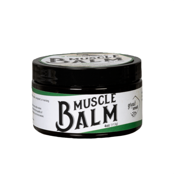 Small black jar of Yoder's Natural Muscle Balm with white label featuring bold text and green accents, crafted in the USA for Health & Wellness and Best Sellers collections.