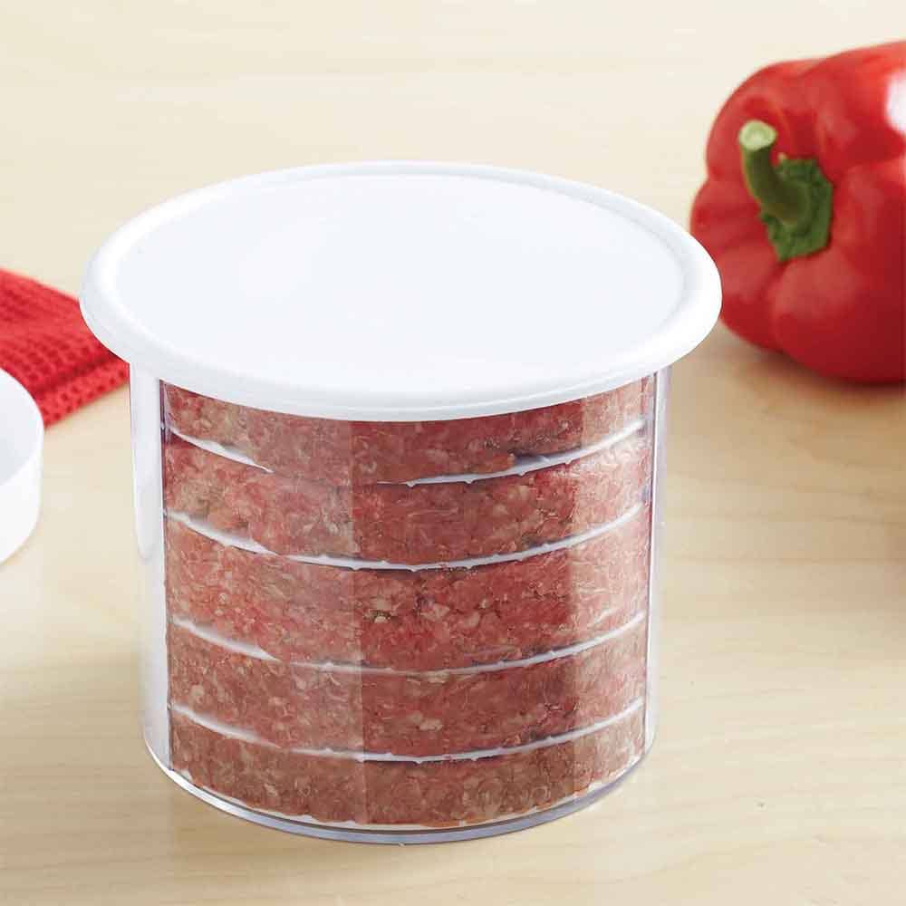 Clear plastic storage container with white lid holding neatly stacked raw burger patties, ideal for camping, grilling, and farm-related outdoor cooking activities.