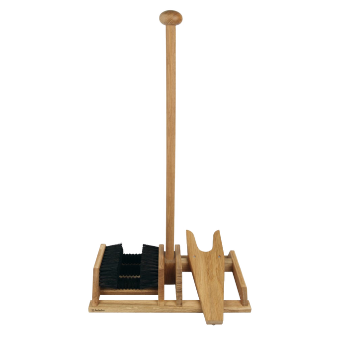 Handcrafted oak bootscraper with sturdy arenga bristles and integrated bootjack, designed to clean muddy boots easily without bending, ideal for Health & Wellness and Home & Decor.
