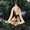 Handcrafted olive wood bell ornament depicting the Flight to Egypt silhouette, a unique keepsake for holiday decor, home accents, and best sellers collections.