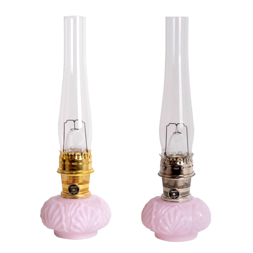 Pair of limited edition vintage-style oil lamps with delicate pink Tuscan glass bases, tall clear chimneys, featuring handcrafted metal hardware, ideal for Lamps & Lighting collections.