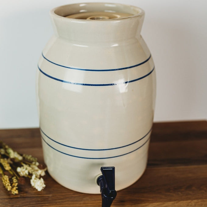 Handcrafted stoneware water cooler with subtle blue stripes and black spigot, made in USA, ideal for Kitchen & Food, Storage and Serving, Best Sellers, and Promo Eligible collections.