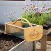 Wood and wire mesh garden hod with curved handle and engraved logo, handcrafted in USA, used for carrying and washing fresh harvests, part of Farm, Garden & Tool collection.
