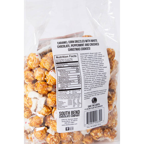 Clear bag of handcrafted caramel popcorn drizzled with white chocolate and mixed with peppermint pieces and crushed Christmas cookies, featured in Kitchen & Food, Snacks and Sweets, Popcorn, and Best Sellers collections.