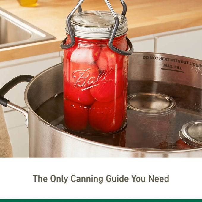 Handcrafted jar lifter removing a sealed Ball mason jar filled with whole tomatoes from a stainless steel water bath canner, featured in USA Made and Best Sellers collections.