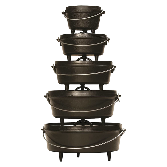 Stacked cast iron ovens with built-in legs and flanged lids for outdoor cooking, crafted in the USA; ideal for camping, farm, garden, and tool collections.