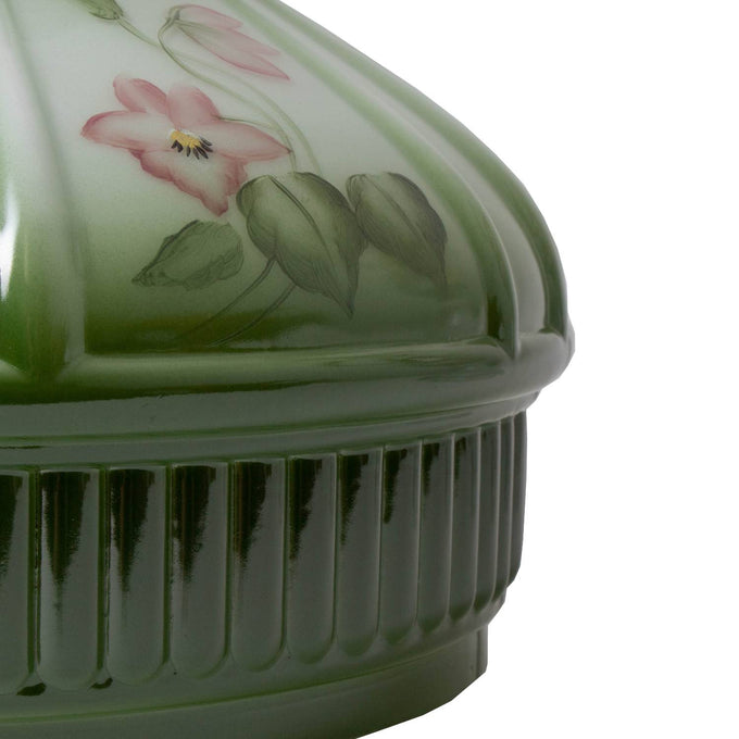 Close-up of a handcrafted glass oil lamp shade featuring soft green hues blending to white with delicate violet floral details, perfect for Lamps & Lighting and Parts and Accessories collections.