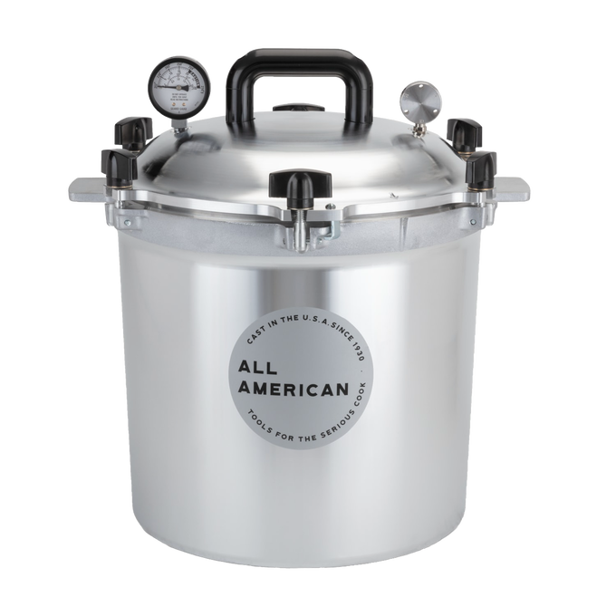 Handcrafted heavy-duty pressure canner with sturdy aluminum construction, dual pressure gauges, and secure shut-off clamps, ideal for safe food preservation in kitchen and canning collections.