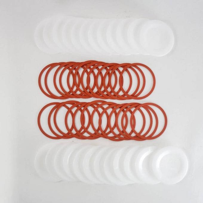 Sets of translucent wide-mouth reusable plastic canning lids with matching orange rubber sealing rings, made in USA for Kitchen & Food, Food Preservation, Canning, and Best Sellers collections.