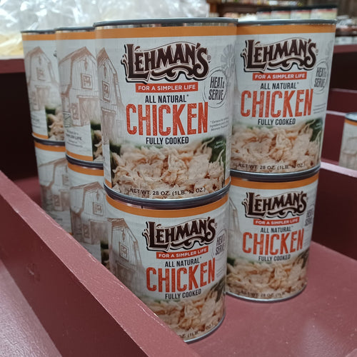 Stack of Lehman’s canned fully cooked all natural chicken displayed on reddish wooden shelving, highlighting a convenient pantry staple for Kitchen & Food, Food, Meats, Best Sellers, and Promo Eligible collections.