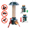 Metal bird feeder with a green top and base, filled with mixed seeds and sunflower, designed to keep out squirrels, chipmunks, and large birds, shown with birds feeding, featured in Farm, Garden & Tool and Animal Care collections.