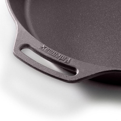 Close-up of a durable cast iron skillet helper grip featuring embossed brand name, highlighting its solid construction for Farm, Garden & Tool, Kitchen & Food, Camping, Cookware, Cast Iron, Best Sellers, and Promo Eligible collections.