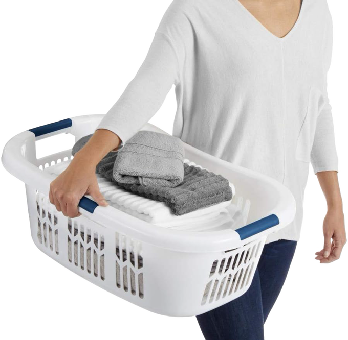 White plastic laundry basket with blue grip handles and ventilated sides, designed for comfortable and easy carrying of laundry, made in USA, featured in laundry supplies and home decor collections.