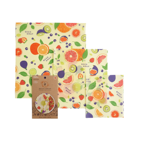 Set of three handcrafted muslin wraps coated with beeswax featuring colorful citrus and berry patterns, eco-friendly reusable food storage from Kitchen & Food, Storage and Serving, USA Made, and Best Sellers collections.