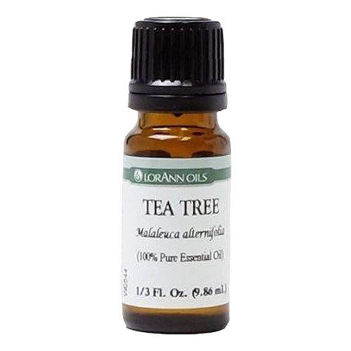 Amber glass bottle with black cap containing handcrafted Tea Tree essential oil, 100% pure and ideal for Health & Wellness, soapmaking, and candlemaking uses.
