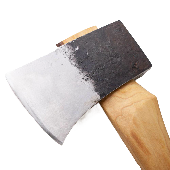 Handcrafted American-made axe head with polished carbon steel blade and rustic blackened poll, resting on an Amish-made hickory handle, featured in Farm, Garden & Tool and Knives & Axes collections.