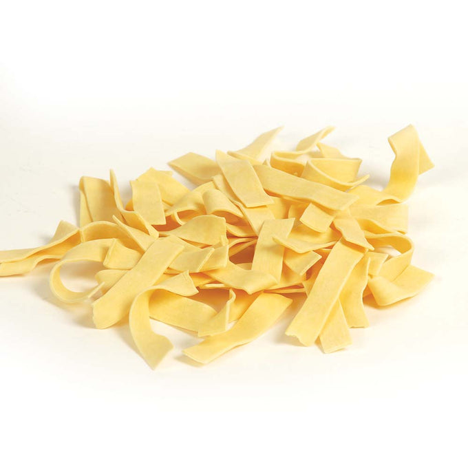 Pile of handcrafted Amish-style egg noodles made in USA, perfect for Kitchen & Food, Pantry, USA Made, Best Sellers, and Promo Eligible collections.