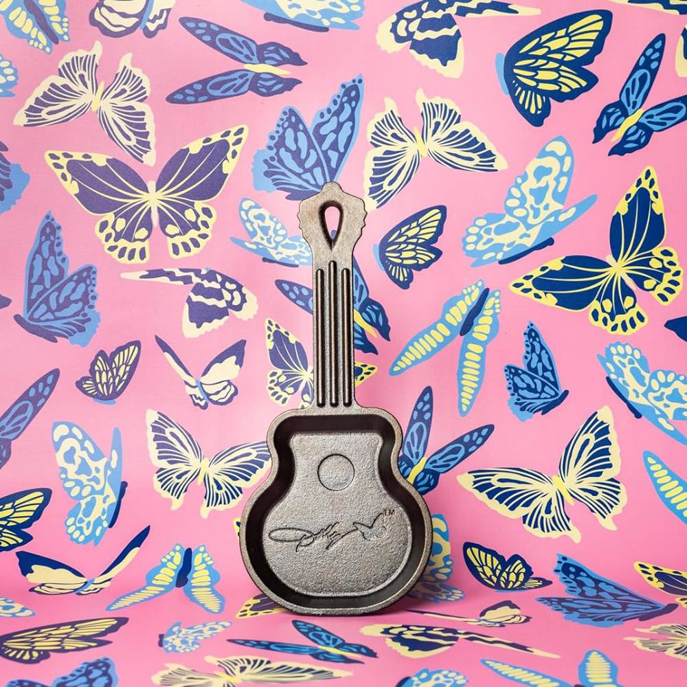Handcrafted cast iron mini skillet shaped like a guitar with an embossed signature design, made in USA, ideal for Kitchen & Food, Cookware, Cast Iron, USA Made, Best Sellers, and Promo Eligible collections.