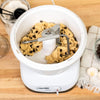 White stand mixer bowl with dough hook kneading chocolate chip cookie dough on wooden counter, surrounded by baking tools and ingredients, Kitchen & Food, Baking Supplies collections