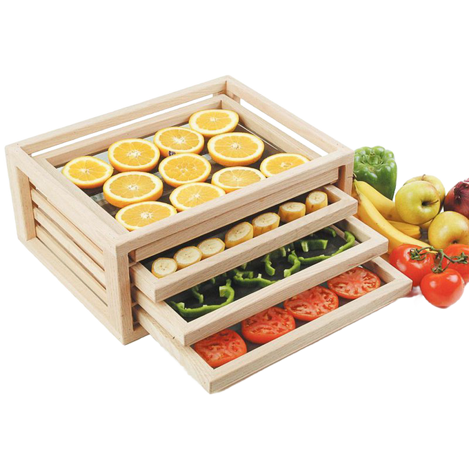 Handcrafted solid oak food drying rack with three fiberglass mesh trays holding sliced oranges, bananas, green peppers, and tomatoes, ideal for kitchen food preservation and drying, made in USA.