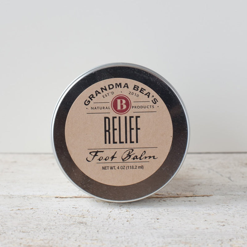 Handcrafted metal tin of natural relief foot balm with simple brown label, soothing balm made in USA, part of Health & Wellness, Balms, Creams and Lotions, and Best Sellers collections.