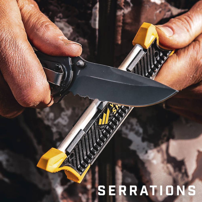 Hands holding a black folding knife being sharpened on a compact, black and yellow pocket knife sharpener, suitable for Farm, Garden & Tool and Knives & Axes collections.