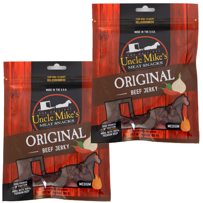 Two resealable bags of handcrafted original flavored beef jerky with clear windows showing dark meat strips, highlighting a medium-spiced, protein-rich snack made in USA for Kitchen & Food, Meats, Best Sellers, and Promo Eligible collections.