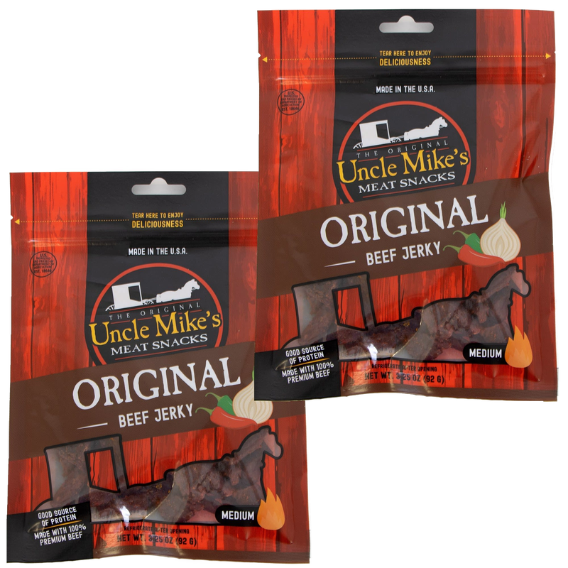 Two resealable bags of handcrafted original flavored beef jerky with clear windows showing dark meat strips, highlighting a medium-spiced, protein-rich snack made in USA for Kitchen & Food, Meats, Best Sellers, and Promo Eligible collections.