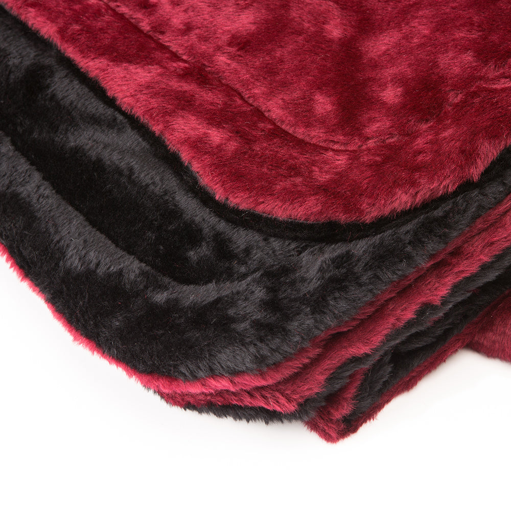 Close-up of handcrafted Amish made lap robe featuring plush warm faux fur in deep red and black with quilted synthetic lining, perfect for Home & Decor and USA Made collections.