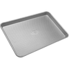 Durable aluminized steel half sheet pan with ribbed surface for even heat conduction, perfect for baking and roasting, part of Kitchen & Food, Cookware, and USA Made collections.